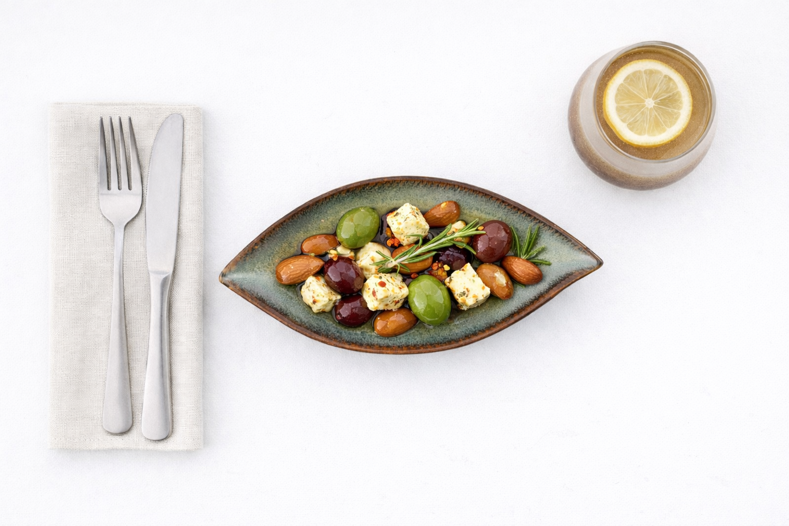 Olives, feta, and almonds on display – Emerald Essence